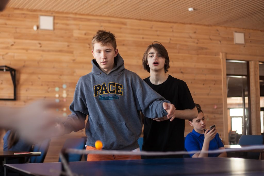 people playing table tennis